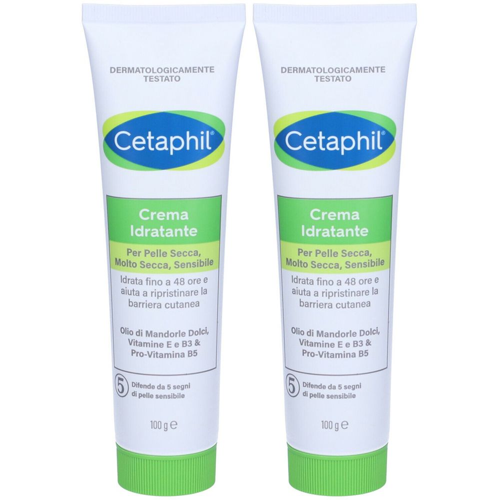 Due tubi di Cetaphil Crema Idratante. Tubi bianchi con fascia verde e testo. Contiene olio di mandorle, vitamina E e B3.