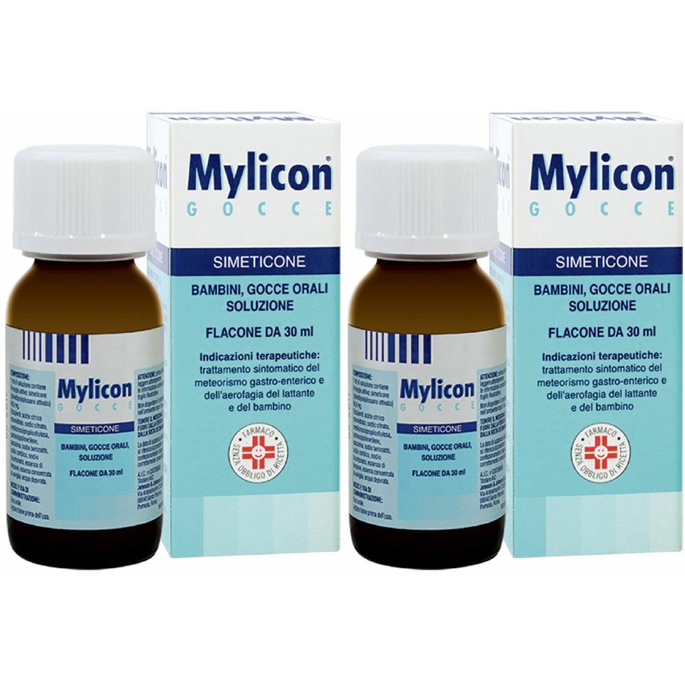 Due flaconi e due scatole. Scritta: Mylicon Gocce, Simeticone, Bambini, Gocce Orali, Soluzione, Flacone da 30 ml.
