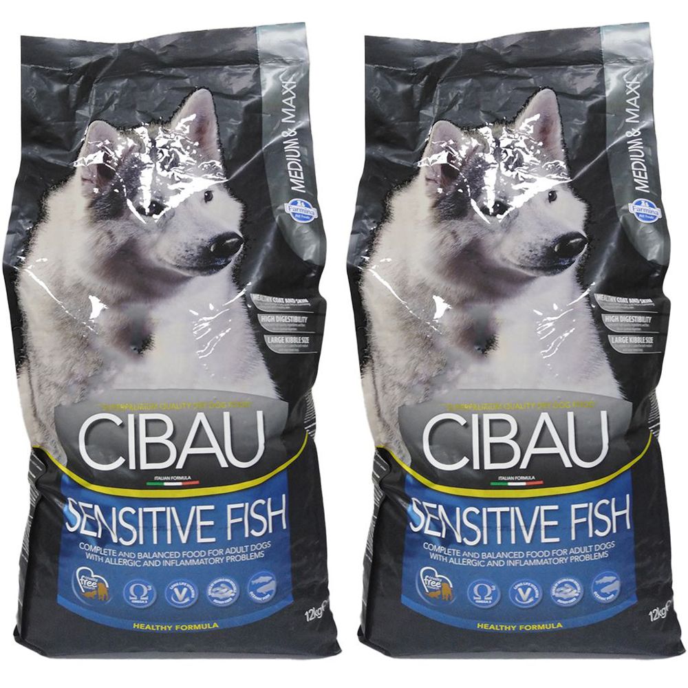 Due sacchi di cibo per cani. Scritta CIBAU Sensitive Fish. Immagine di un cane. Sfondo nero. Testo: MEDIUM & MAX.