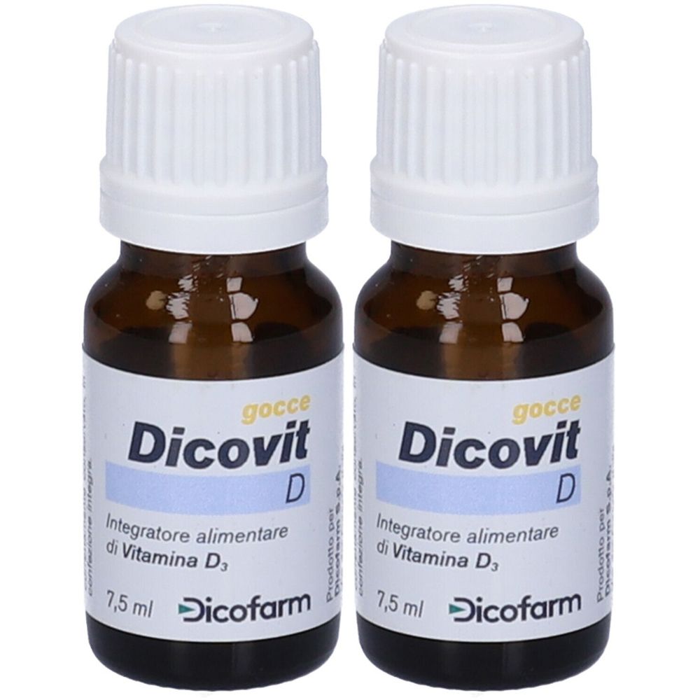 Due flaconi di Dicovit D, integratore alimentare di vitamina D. Flaconi in vetro marrone con tappo bianco ed etichetta.