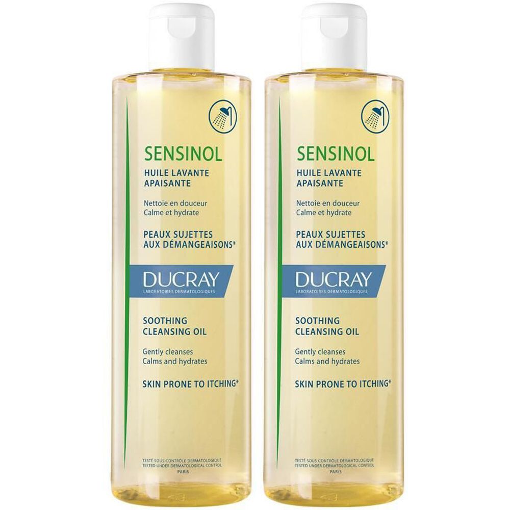 Due flaconi di liquido giallastro. Scritta: Sensinol, Ducray. Per pelli soggette a prurito. Olio detergente.