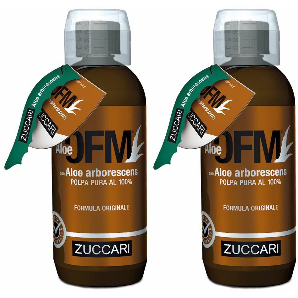 Due bottiglie di liquido marrone con etichette. Testo: Aloe OFM, ZUCCARI. Targhette verdi.