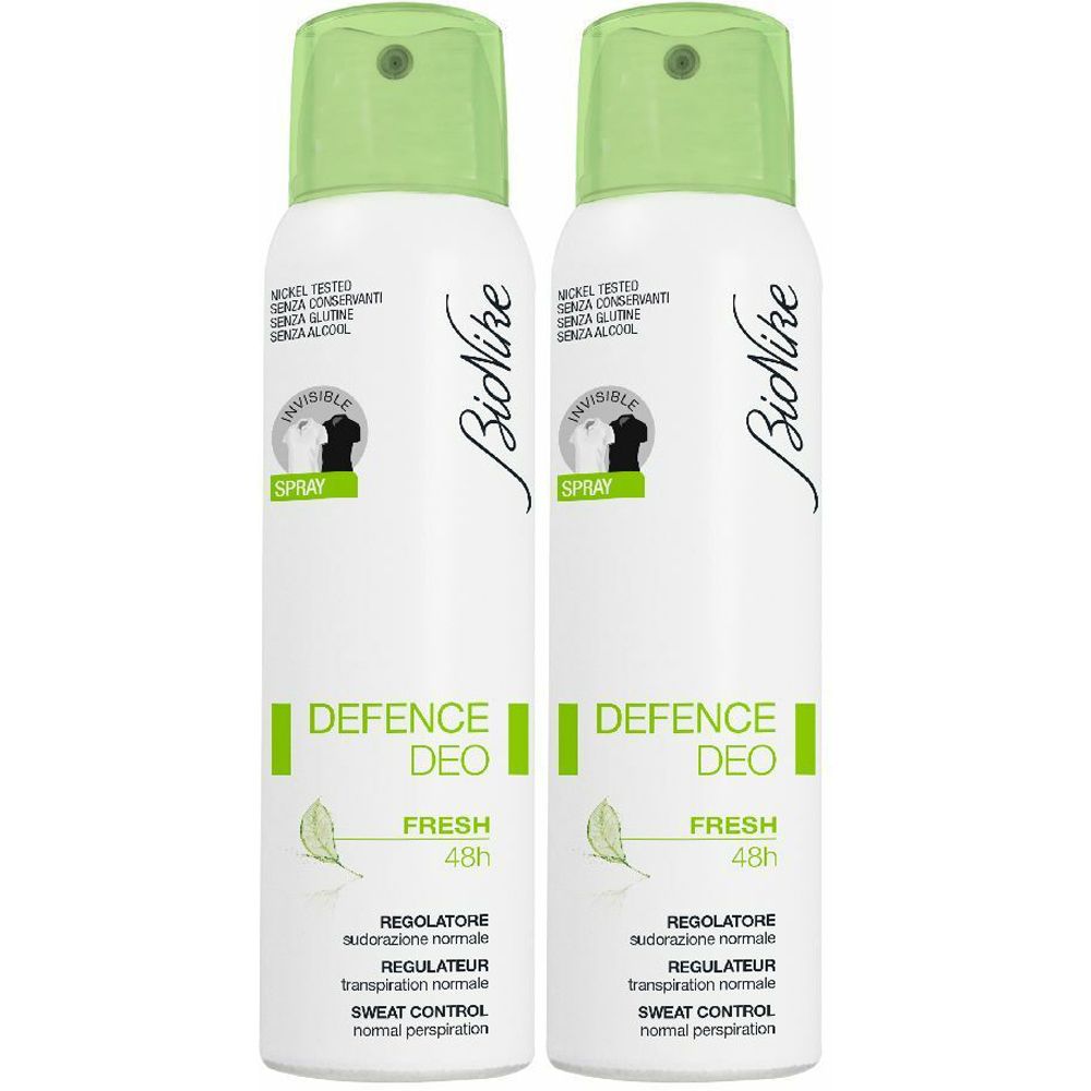 Due flaconi spray bianchi con tappi verdi. Scritta: Defence Deo Fresh 48h, marchio BioNike. Con logo e testo.