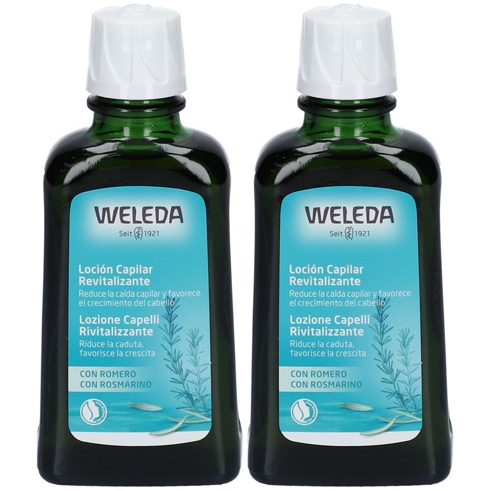 Due flaconi verdi con tappi bianchi. L'etichetta riporta "WELEDA" e "Loción Capilar Revitalizante".