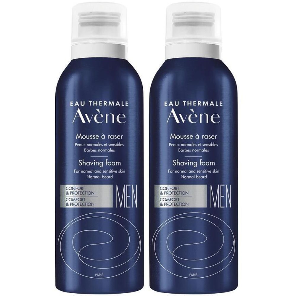 Due flaconi blu di schiuma da barba. Scritta: Eau Thermale Avène, Mousse à raser, Shaving foam, MEN.
