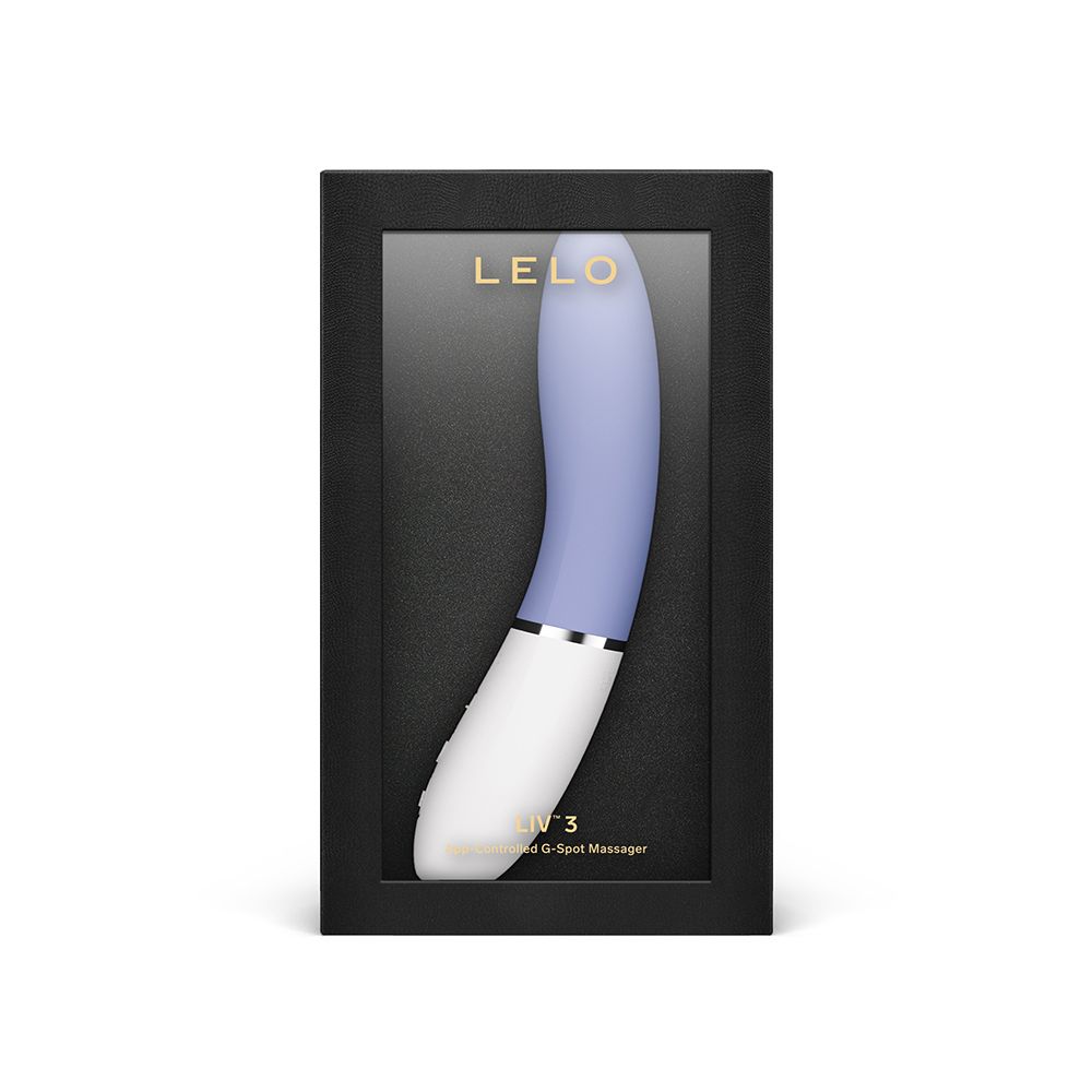 Schwarze Box mit Vibrator. Lila-weißer Vibrator durch Fenster sichtbar. Marke LELO.