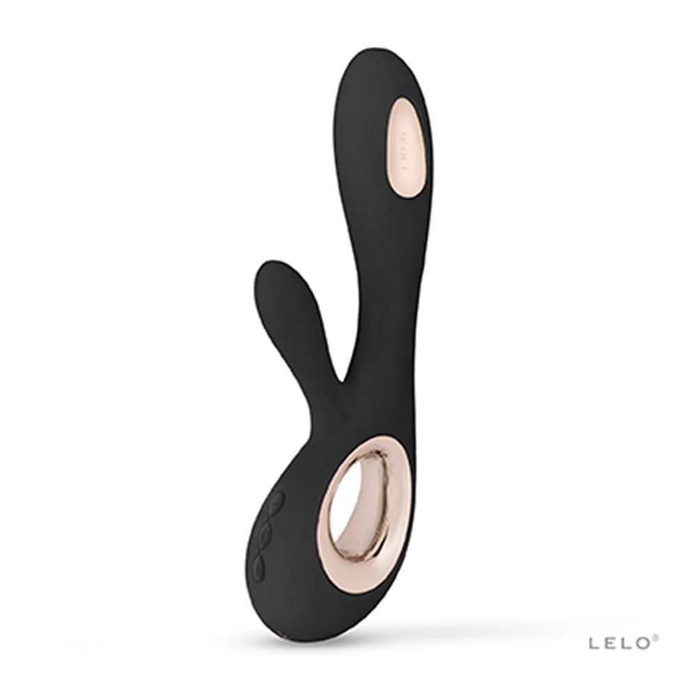 Prodotto benessere nero con dettagli dorati. Forma ergonomica a due estremità.