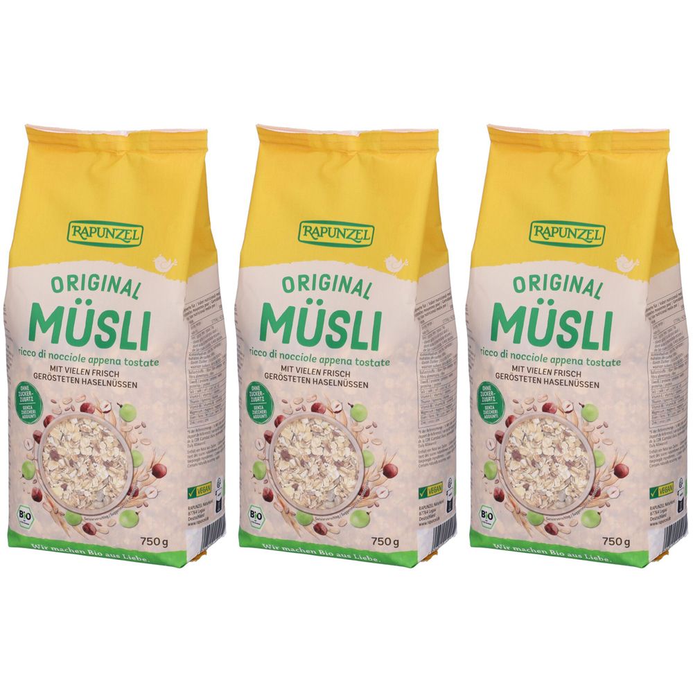Tre confezioni di muesli. Confezione giallo-bianca con logo e nome del prodotto. Testo: Original Muesli, 750g. Certificazione bio.