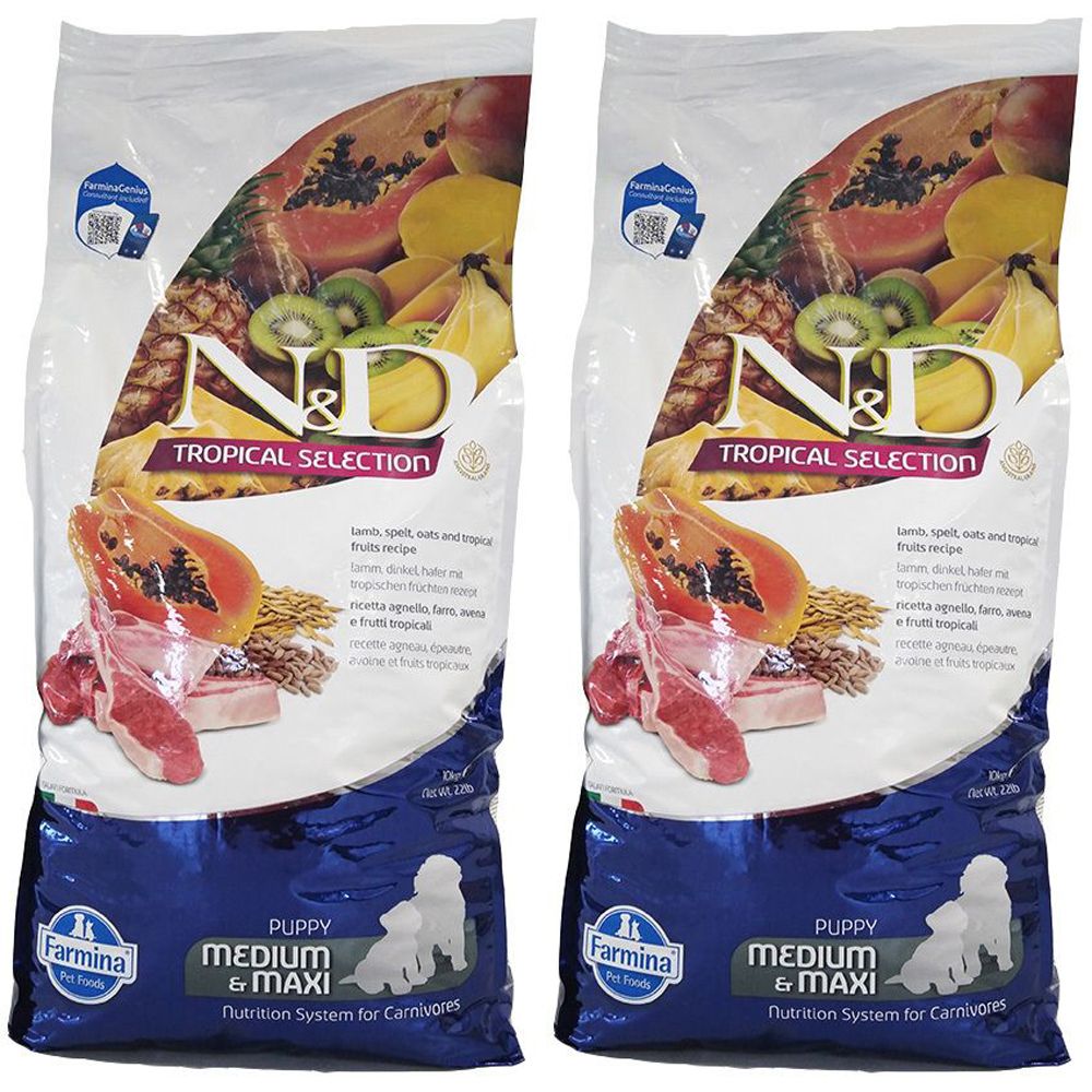 Due sacchi di cibo per cani. Scritta: N&D Tropical Selection, Farmina, Puppy Medium & Maxi. Illustrazione di frutta e carne.