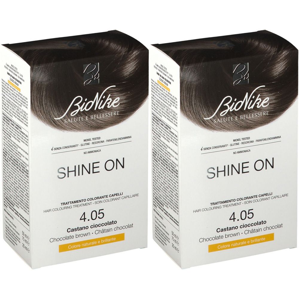 Due confezioni di tinta per capelli. Scritta: Bionike, Shine On, 4.05 Castano Cioccolato. Colore: marrone cioccolato.