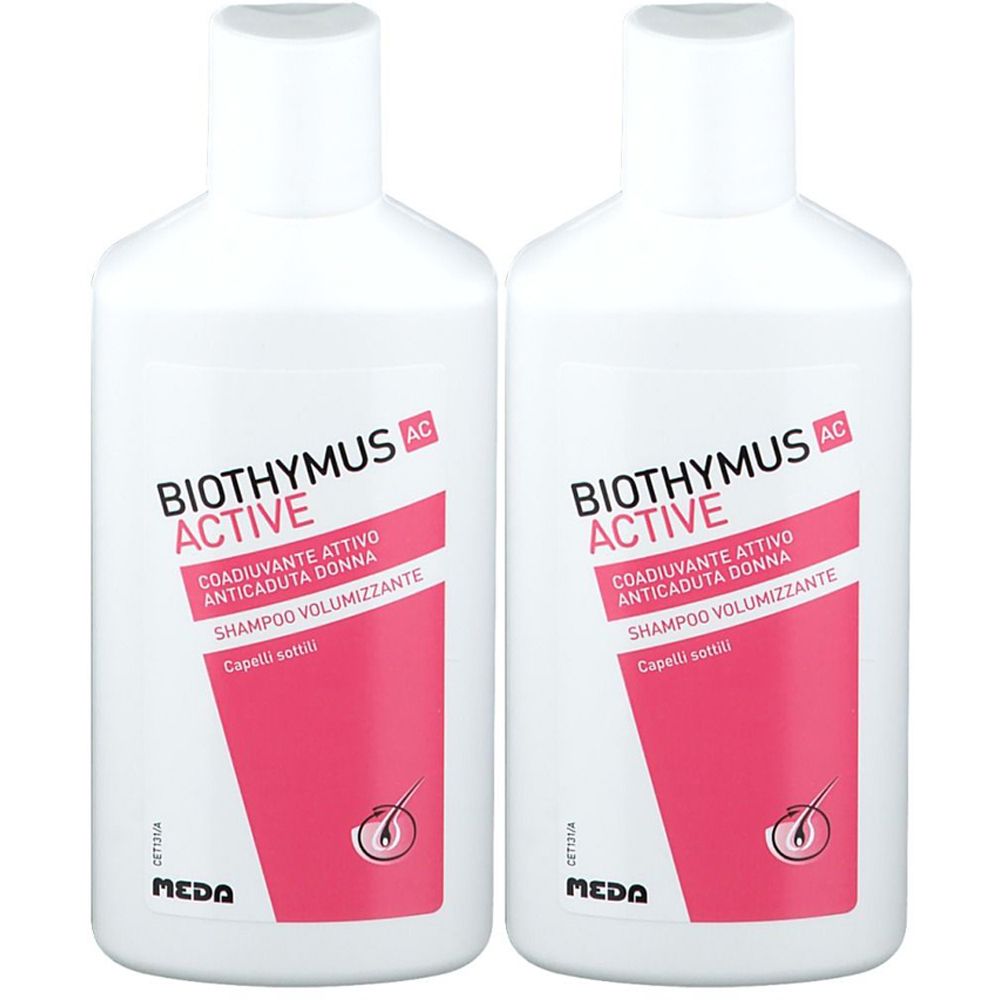 Due flaconi bianchi con etichette rosa. Le etichette riportano "BIOTHYMUS ACTIVE" e "SHAMPOO VOLUMIZZANTE".