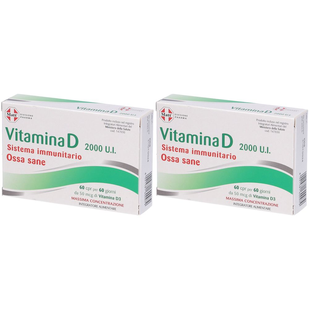 Due scatole di Vitamina D. Scritta: Vitamina D, 2000 U.I., Sistema immunitario, Ossa sane. Confezione verde e bianca.