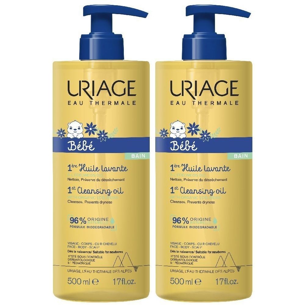 Due flaconi gialli con erogatori blu. Scritta: URIAGE Bébé, 1st Cleansing oil. 96% ingredienti di origine naturale.