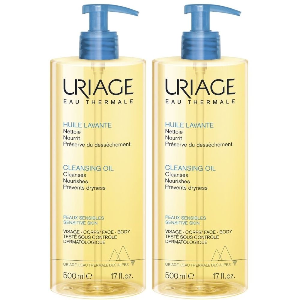 Due flaconi di olio lavante URIAGE con dosatori blu. Scritta: HUILE LAVANTE, CLEANSING OIL. 500 ml.