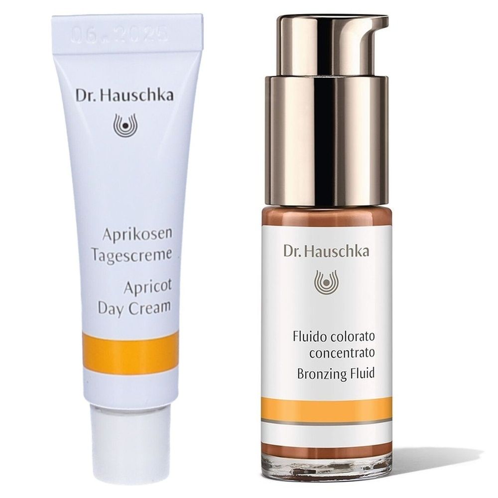 Due prodotti cosmetici. A sinistra: tubo 'Apricot Day Cream'. A destra: flacone 'Bronzing Fluid'. Entrambi con logo e marchio.