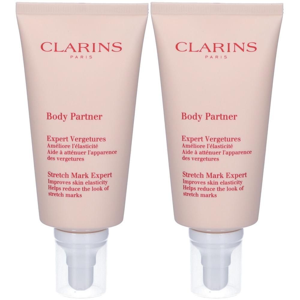 Due tubetti di crema Clarins Body Partner con erogatore a pompa.