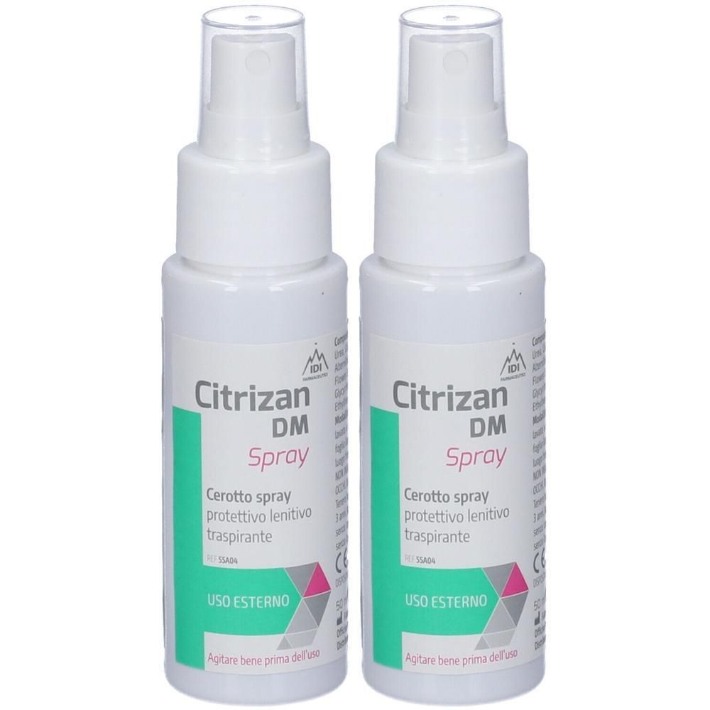 Due flaconi spray bianchi con etichette Citrizan DM Spray.