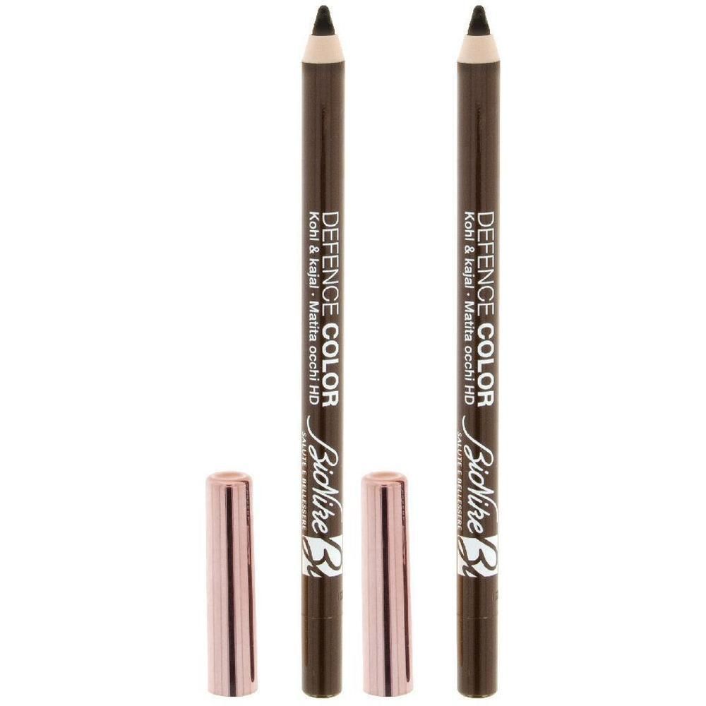 Due matite kohl marroni con cappucci oro rosa. Scritta: DEFENCE COLOR, Bionike.