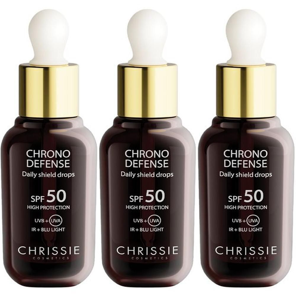 Tre flaconi di Chrissie Chrono Defense Daily Shield Drops con SPF 50.