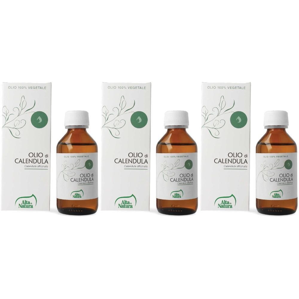 Tre flaconi di olio di calendula con tappi bianchi e scatole bianche. "Olio di Calendula" è visibile sulle etichette.