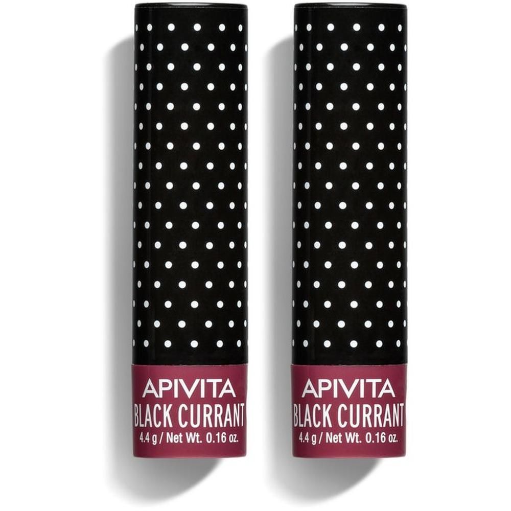 Due balsami labbra con sfondo nero e pois bianchi. Ribes Nero 4,4 g.