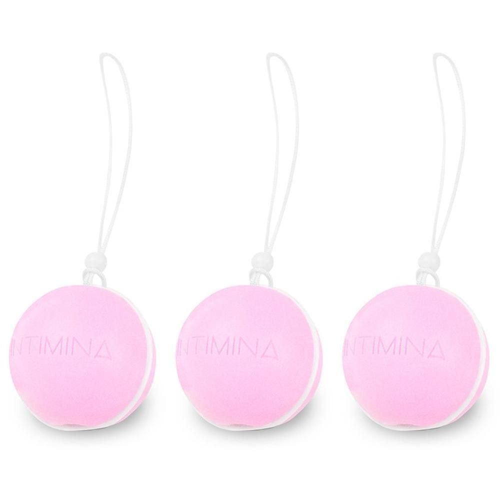 Tre palline di Kegel rosa con cordino.