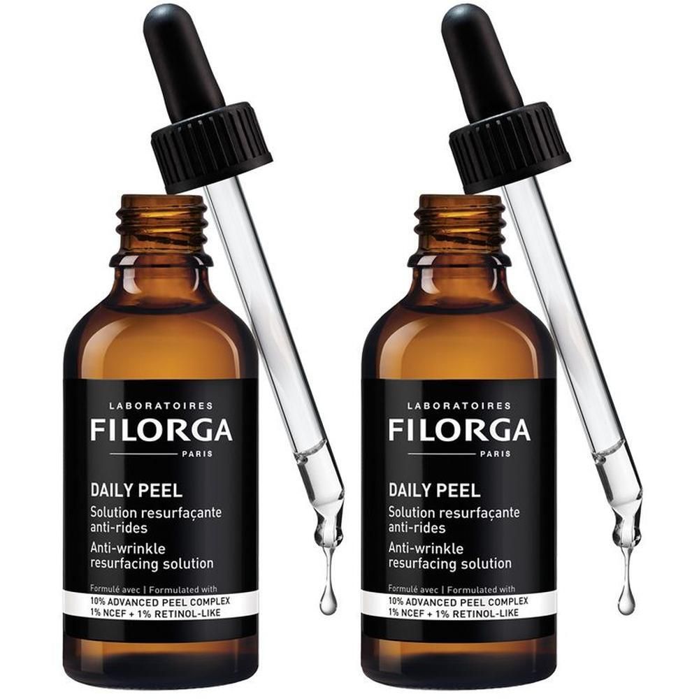 Due flaconi in vetro marrone con contagocce per la soluzione Filorga Daily Peel Anti-Wrinkle.