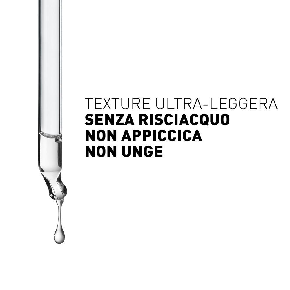 Contagocce con una goccia di soluzione Filorga Daily Peel Anti-Wrinkle.