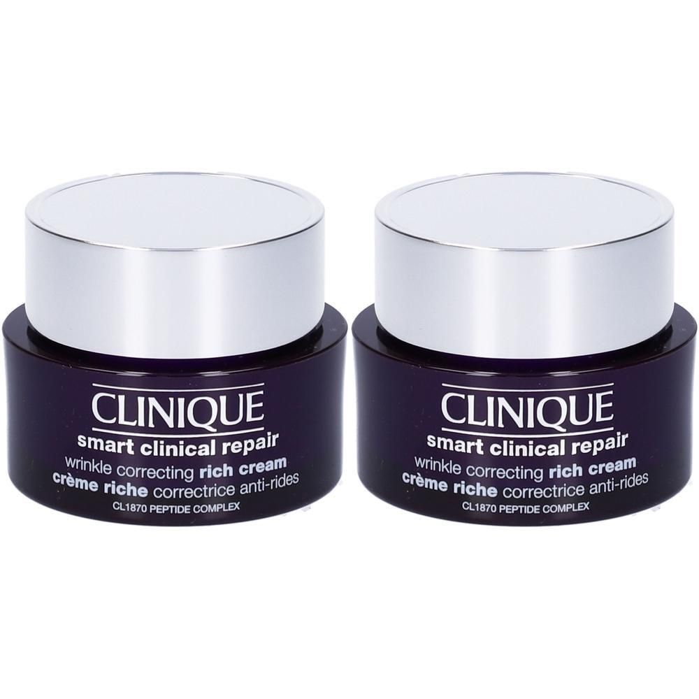 Due vasetti Clinique Smart Clinical Repair con coperchi argentati.