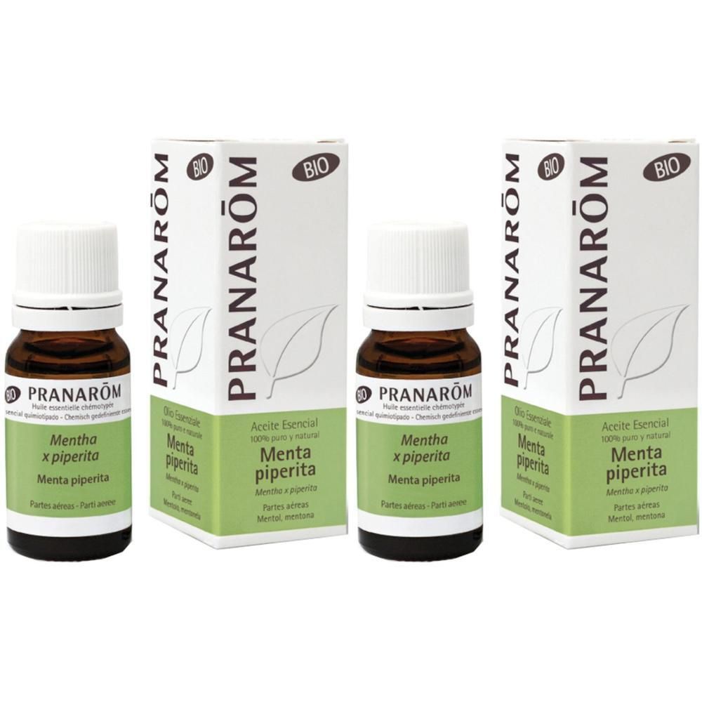 Due flaconi di olio essenziale di menta piperita con scatole. Certificazione bio visibile.