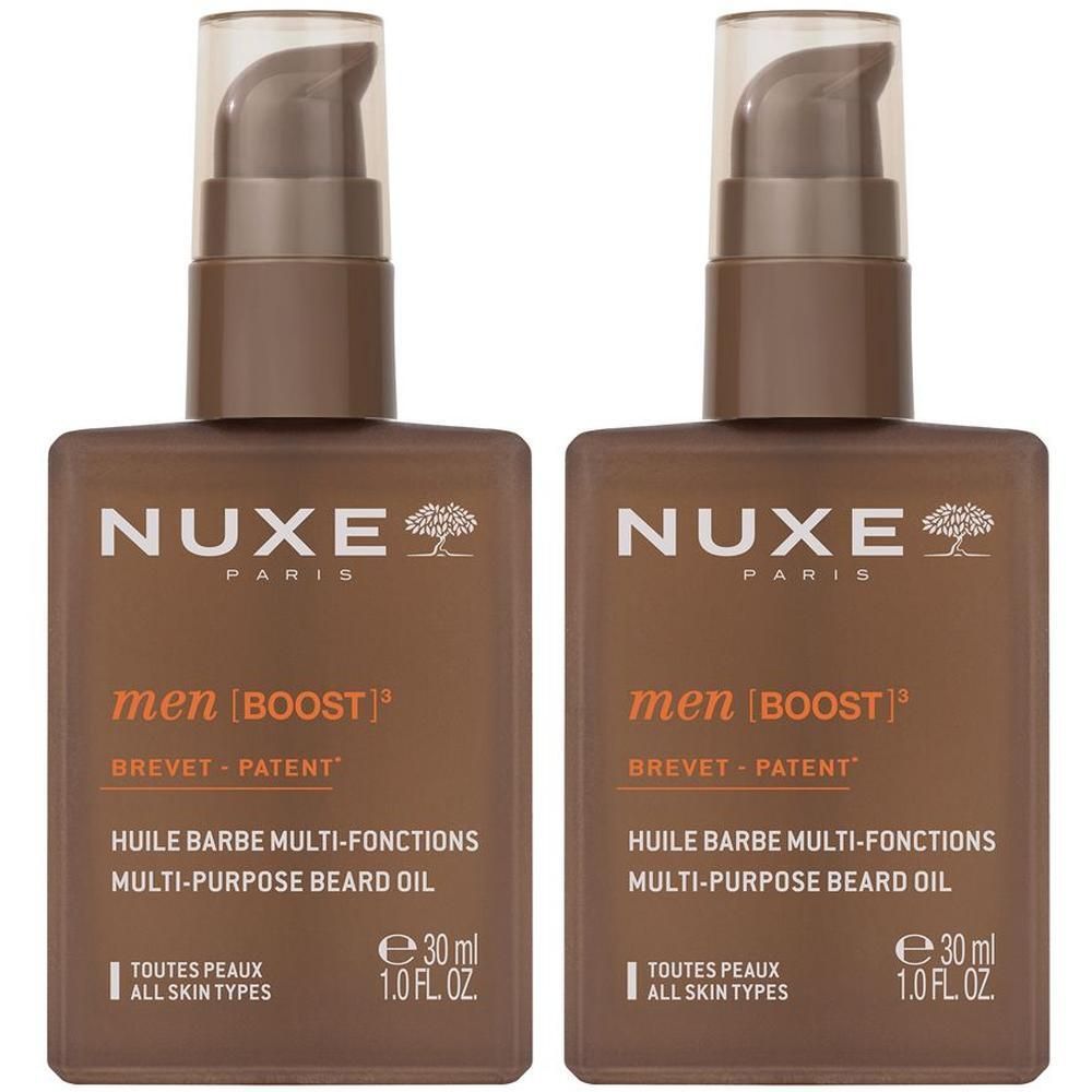 Due flaconi di olio da barba multi-azione Nuxe Men con dispenser a pompa.