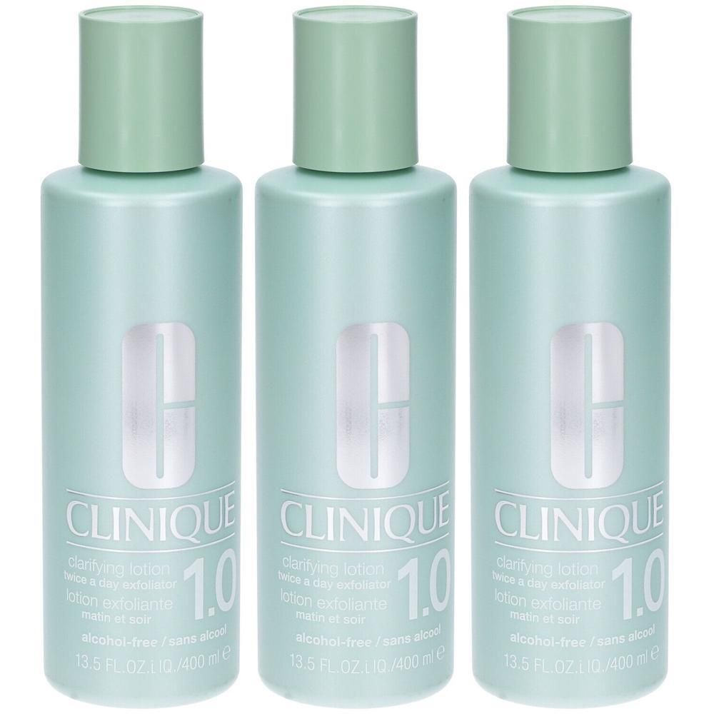 Tre flaconi Clinique Clarifying Lotion 1.0 verde chiaro con logo argentato e tappi verdi.