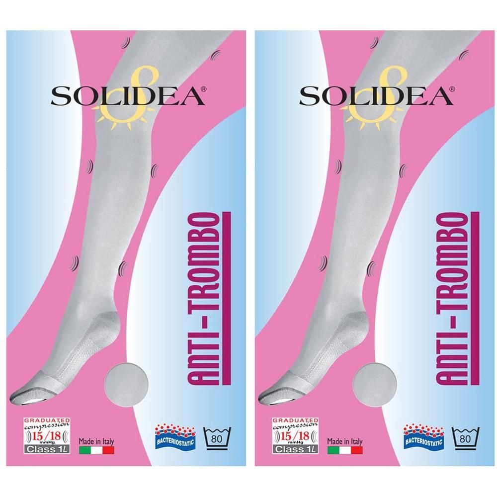 Due confezioni di calze a compressione, bianche, con scritta Anti-Trombo. Graduate, Classe II.