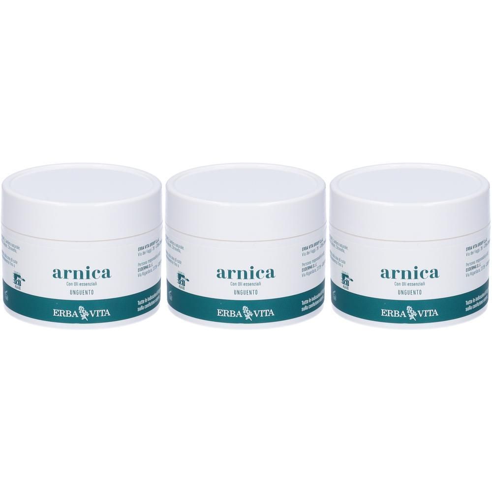 Tre vasetti bianchi di unguento all'arnica, marca Erba Vita.
