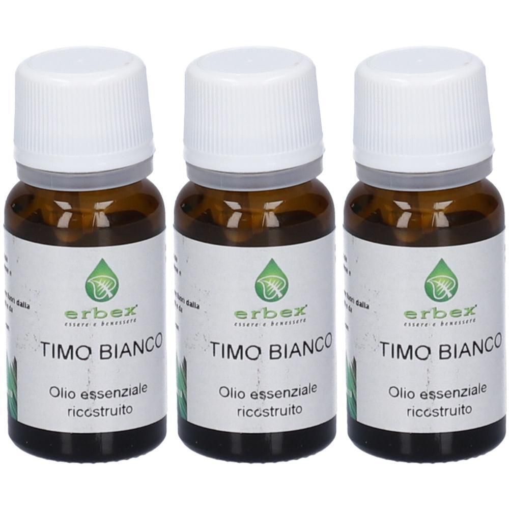 Tre flaconi in vetro ambrato con tappi bianchi, ciascuno con etichetta riportante "TIMO BIANCO" e logo Erba.
