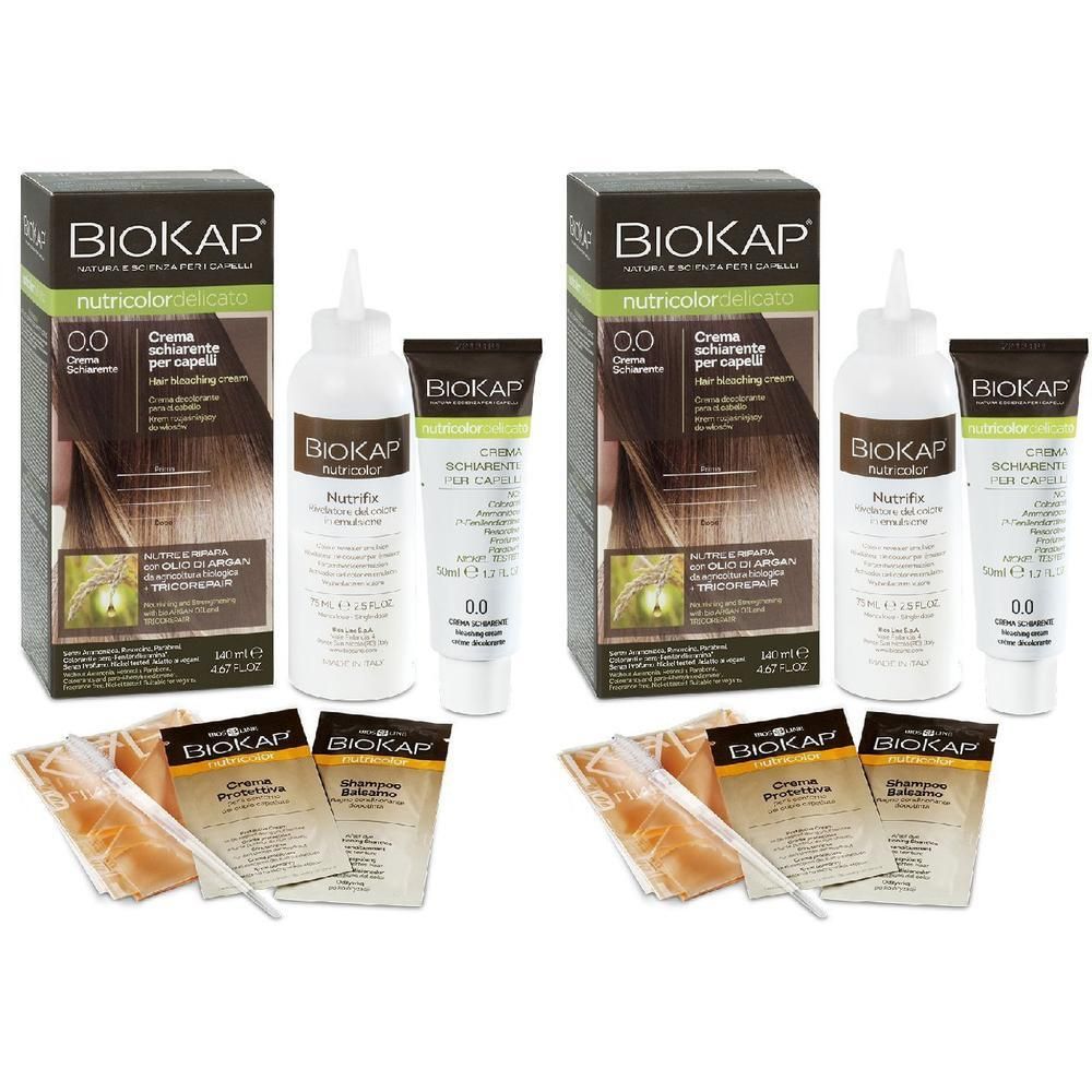 Due kit crema schiarente BIOKAP Nutricolor, ciascuno con flacone e tubetto.
