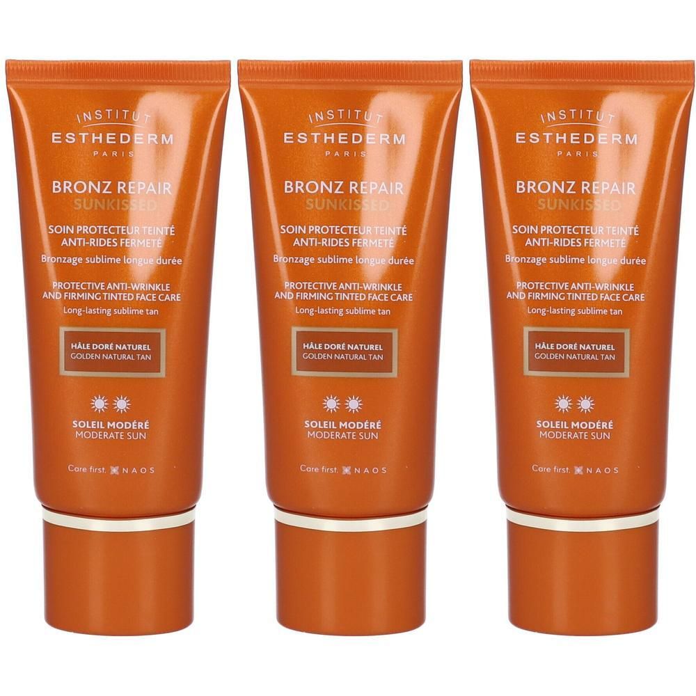 Tre tubetti di crema solare Esthederm Bronz Repair anti-rughe per sole moderato.