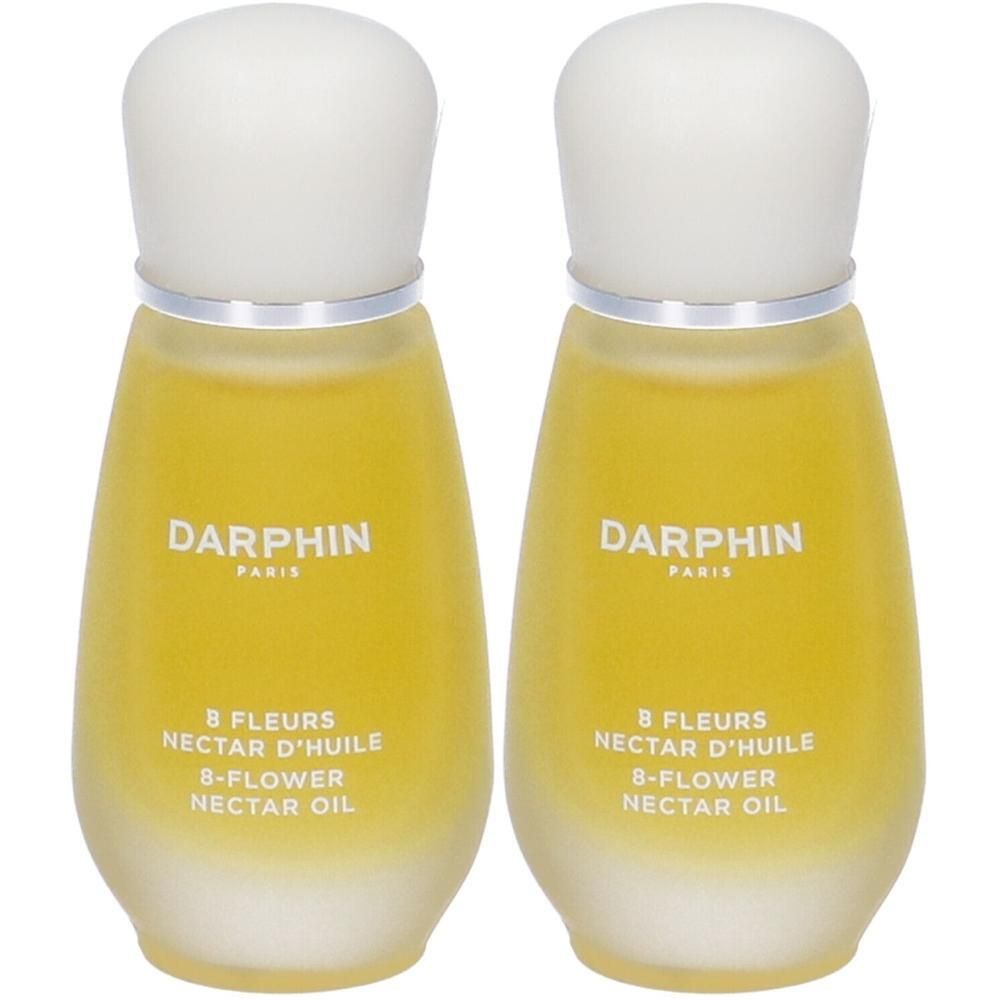 Due flaconi Darphin Olio Nettare 8 Fiori con tappo bianco e anello argento.