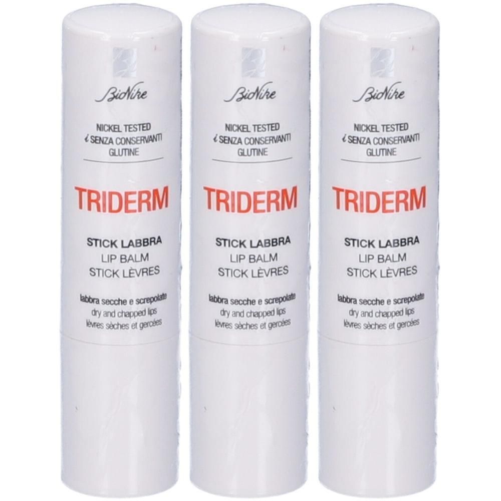Tre stick labbra Bionike Triderm. Contenitore bianco con testo rosso e nero.
