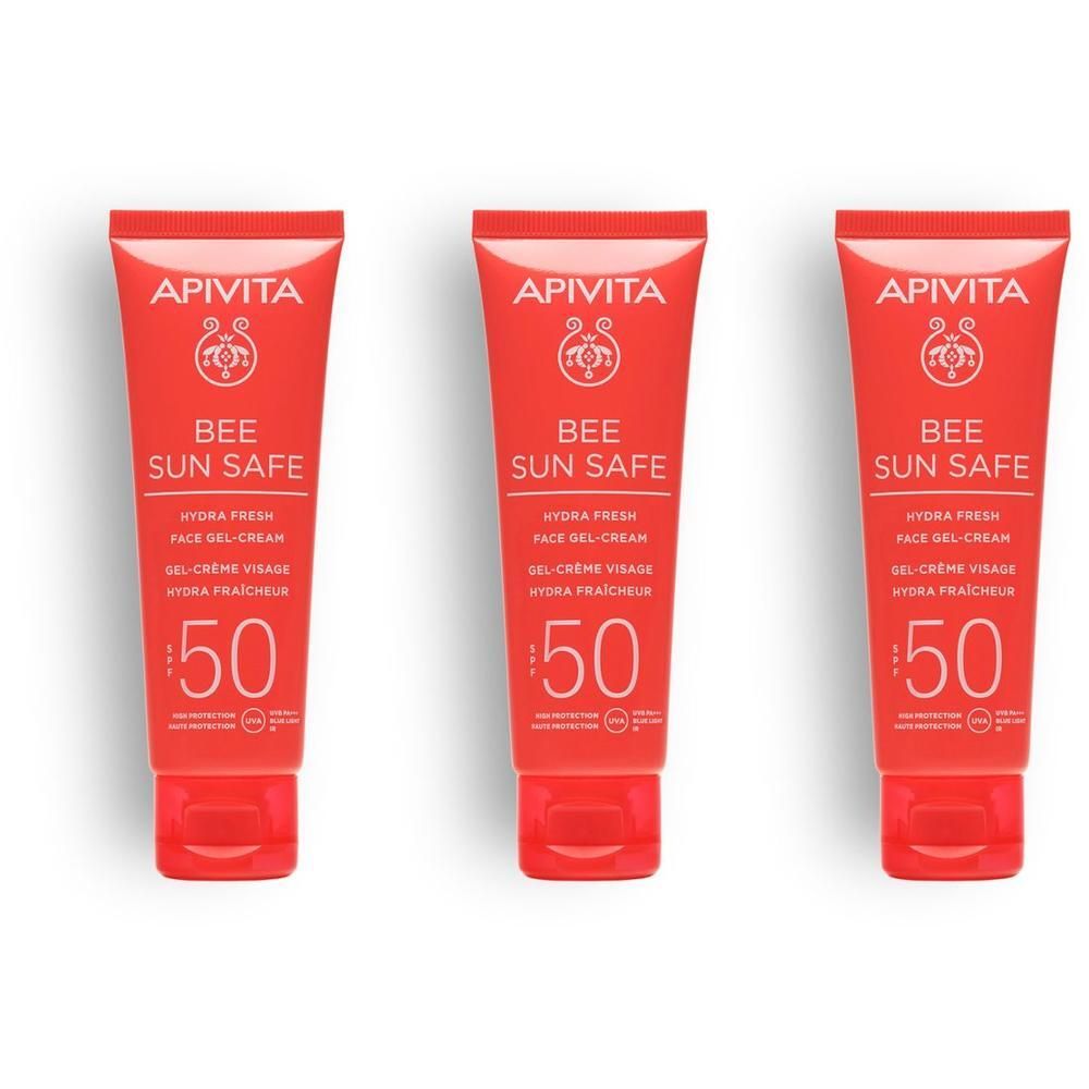 Tre tubetti rossi di crema solare SPF 50, scritta "BEE SUN SAFE".