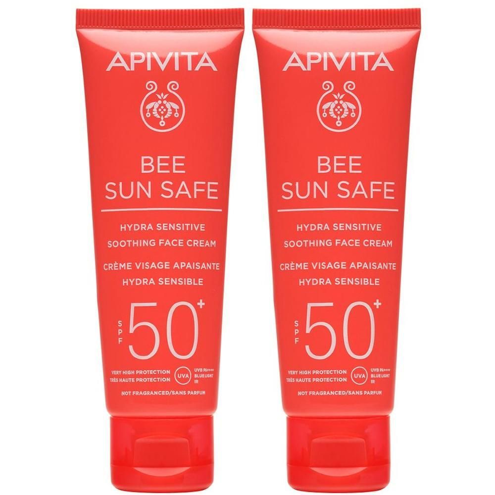 Due tubetti rossi di crema solare viso APIVITA SPF 50+.
