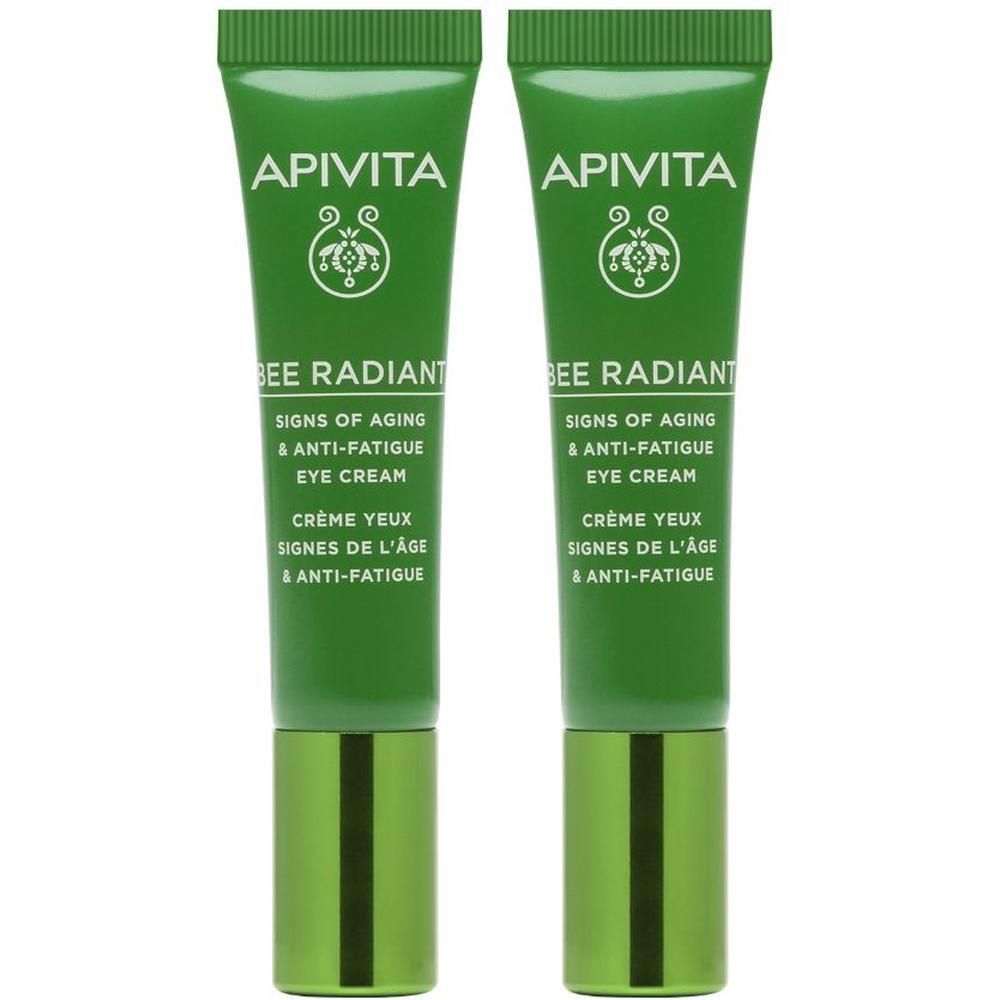 Due tubetti verdi di crema contorno occhi APIVITA Bee Radiant con tappi argentati.
