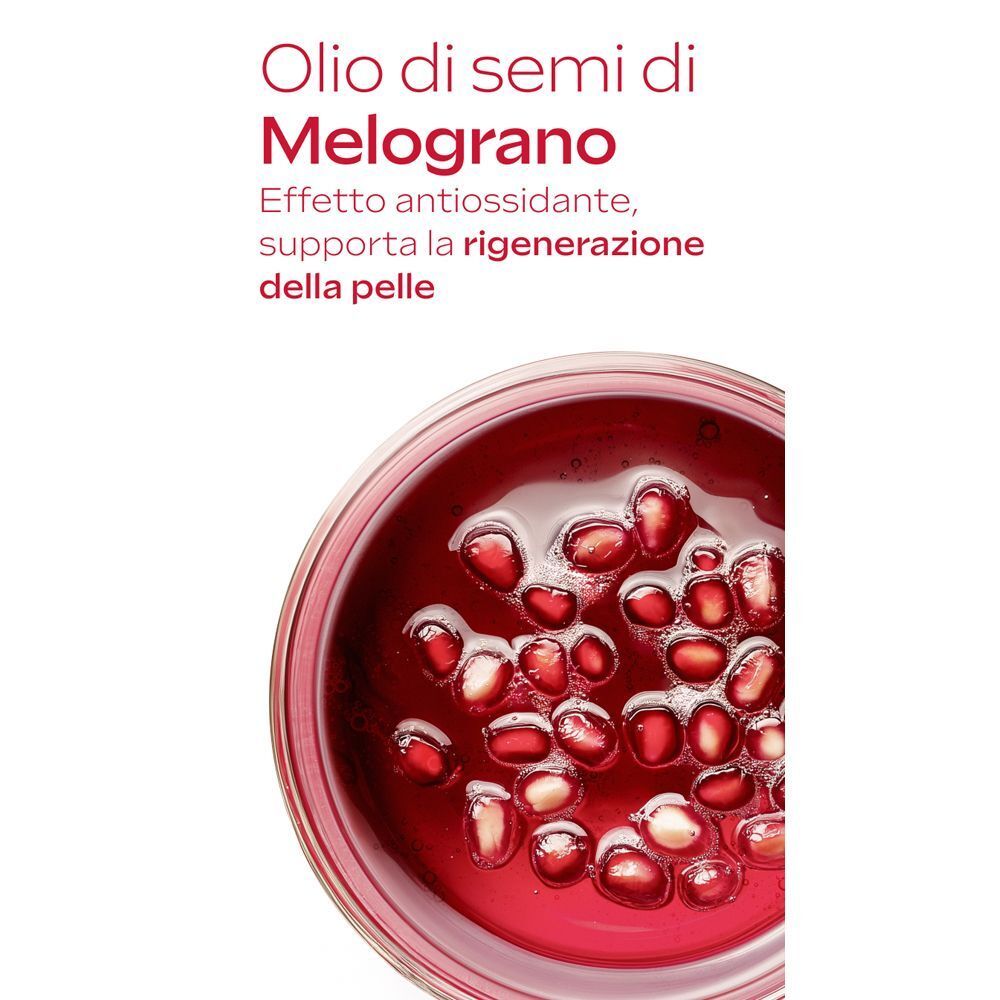 Primo piano di semi di melograno nell'olio, "Olio di semi di melograno" ed "effetto antiossidante".