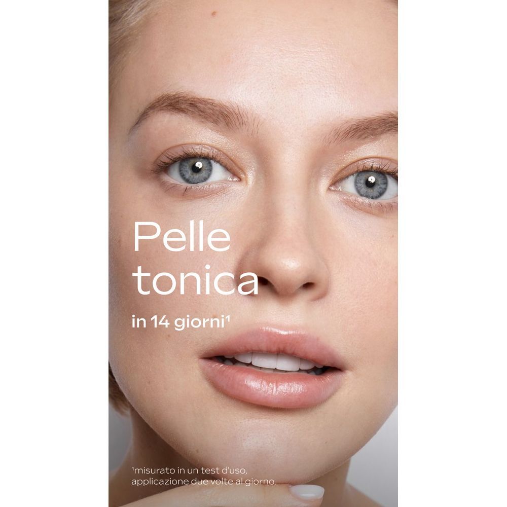 Viso di una donna con testo "Pelle tonica in 14 giorni".