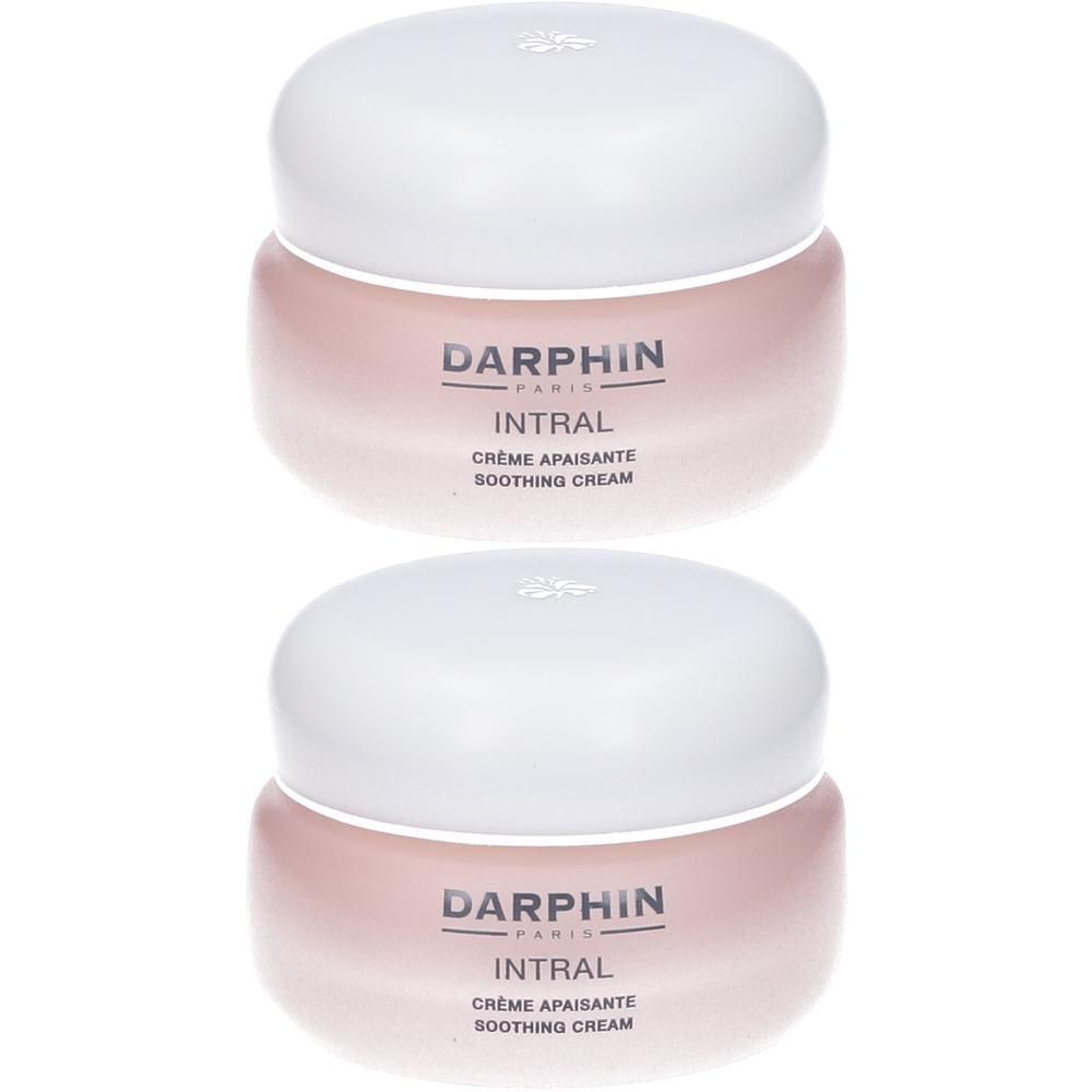 Due vasetti di crema lenitiva Darphin Intral con tappi bianchi e vasetti rosa.