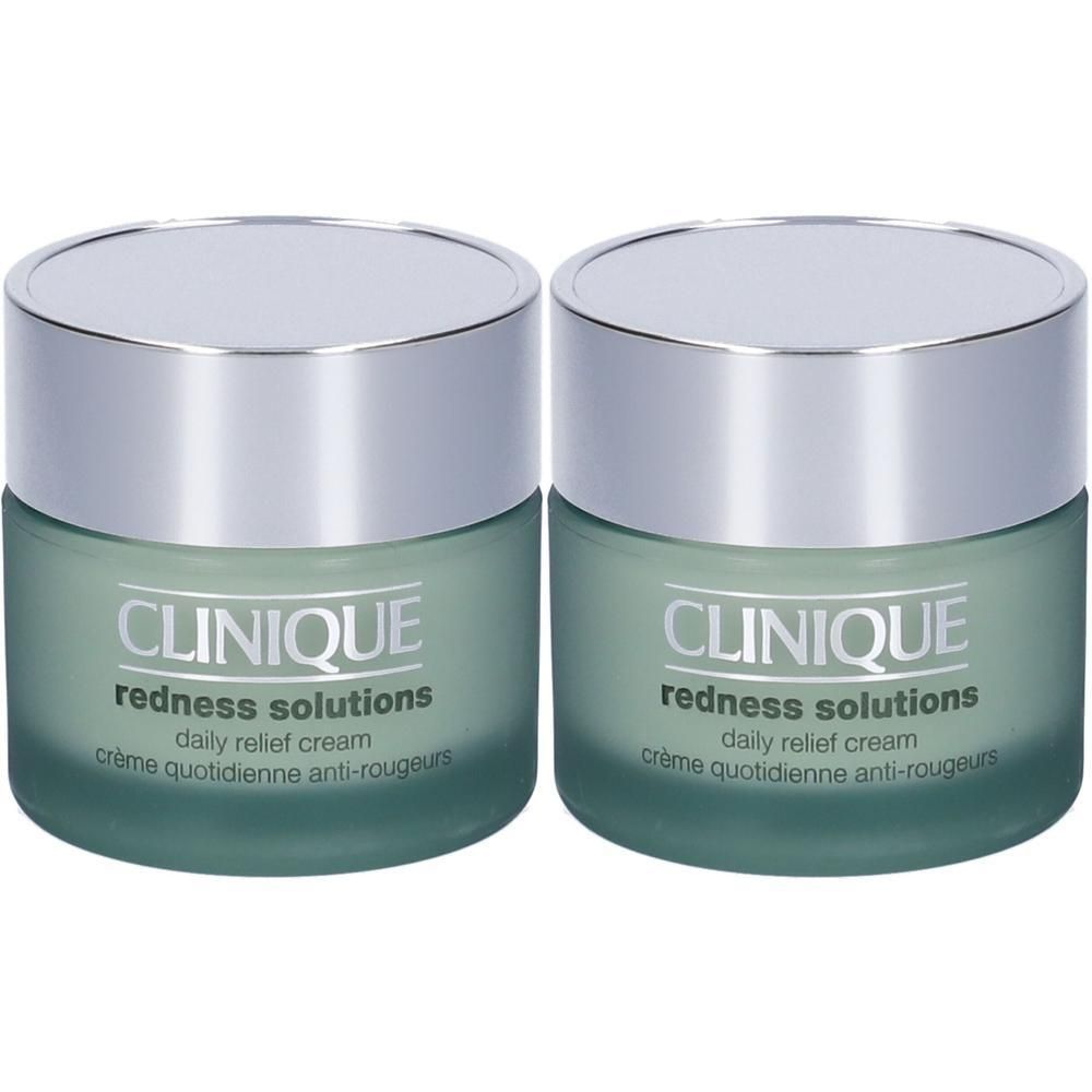 Due vasetti Clinique Redness Solutions con coperchi argentati e corpo in vetro verde.