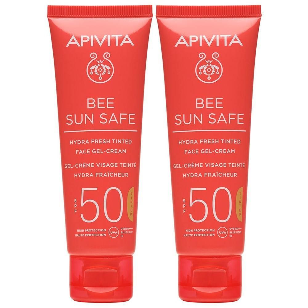 Due tubetti rossi di crema-gel solare APIVITA con SPF 50.
