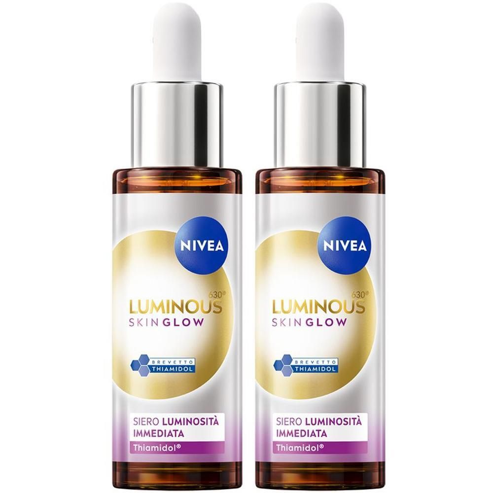 Due flaconi di siero Nivea Luminous630 Skin Glow con contagocce. Flaconi in vetro marrone con etichetta argentata e bianca.
