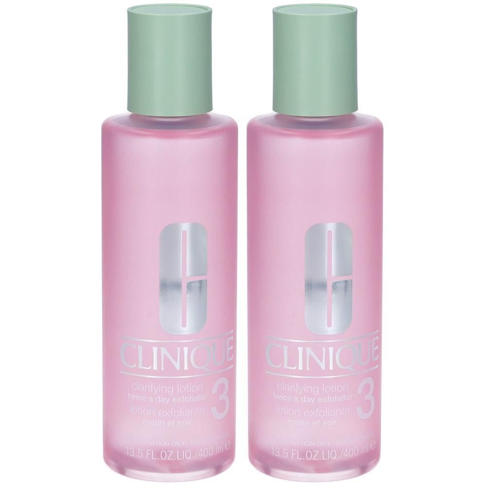 Due flaconi Clinique Clarifying Lotion 3 con liquido rosa e tappi verdi.