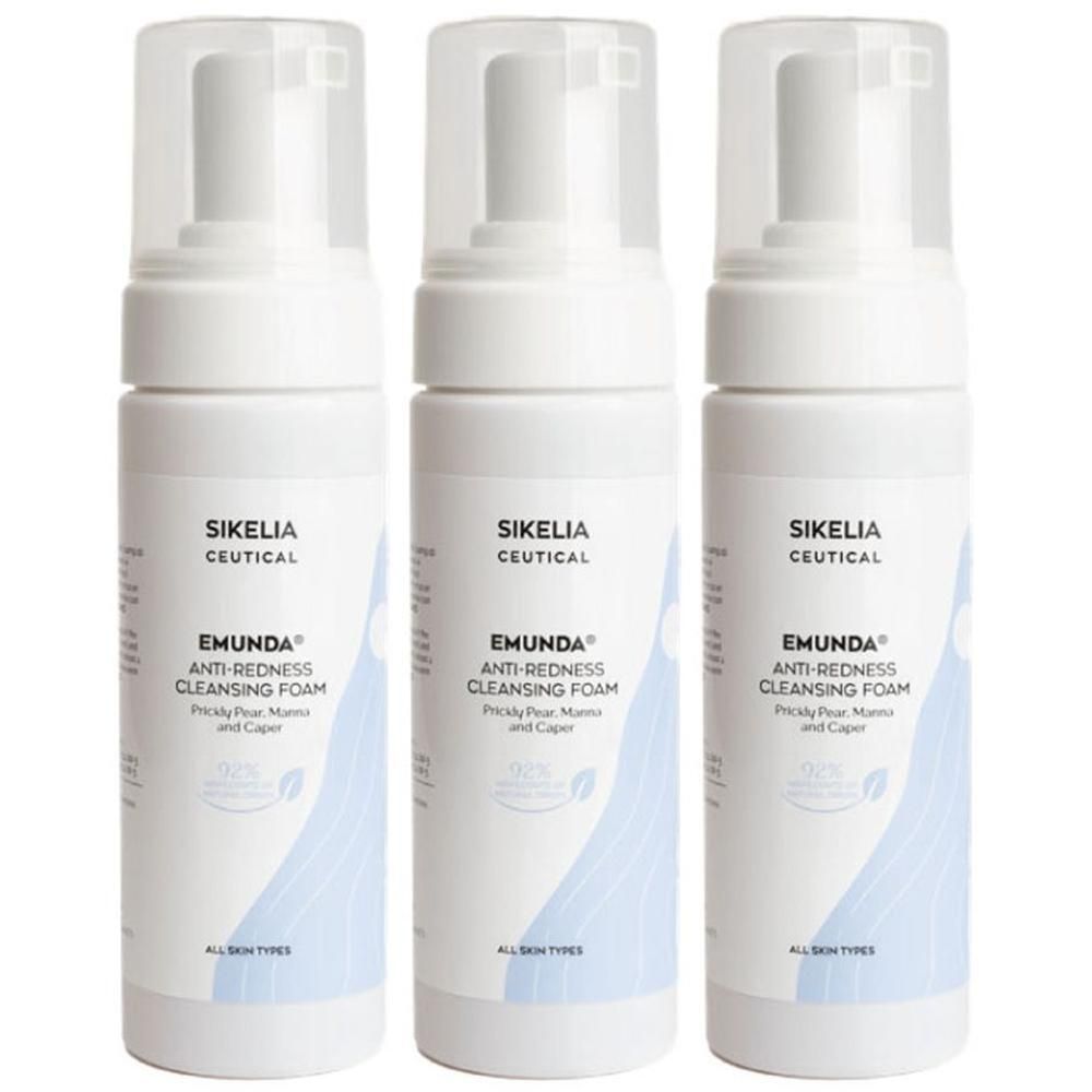 Tre flaconi spray bianchi con la scritta 'EMUNDA ANTI-REDNESS CLEANSING FOAM'.